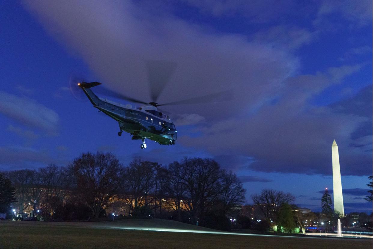 Marine One, carrying President Biden, takes off from the South Lawn of the White House.