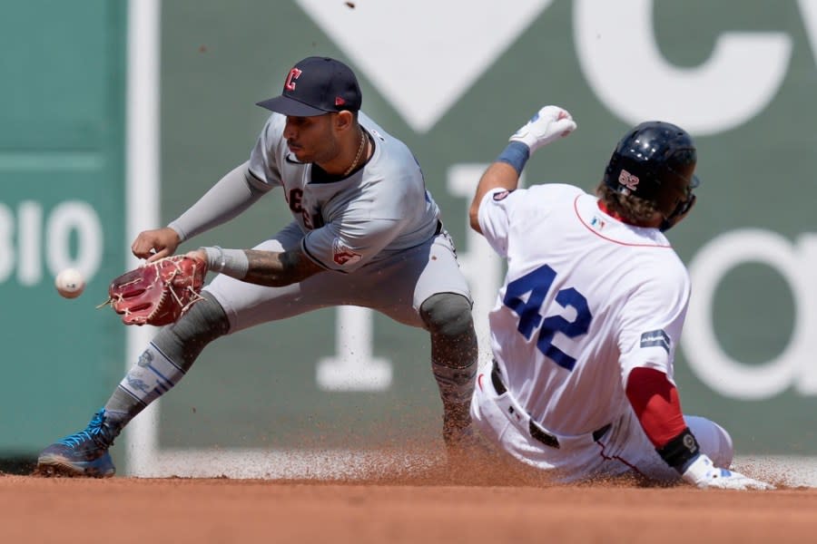 Boston Red Sox’s <a class="link " href="https://sports.yahoo.com/mlb/players/12731/" data-i13n="sec:content-canvas;subsec:anchor_text;elm:context_link" data-ylk="slk:Wilyer Abreu;sec:content-canvas;subsec:anchor_text;elm:context_link;itc:0">Wilyer Abreu</a>, right, steals second base as Cleveland Guardians’ <a class="link " href="https://sports.yahoo.com/mlb/players/11448/" data-i13n="sec:content-canvas;subsec:anchor_text;elm:context_link" data-ylk="slk:Brayan Rocchio;sec:content-canvas;subsec:anchor_text;elm:context_link;itc:0">Brayan Rocchio</a> gets the late throw during the fifth inning of a baseball game, Monday, April 15, 2024, in Boston. (AP Photo/Michael Dwyer)