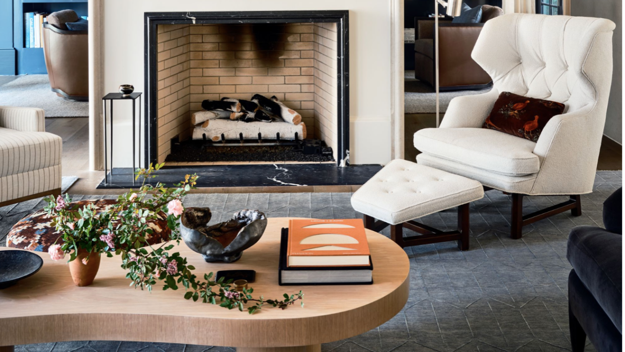 a living room with a fireplace