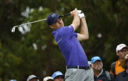 Jordan Spieth of the United States tees off on the fourth hole during the first round of the Australian Open golf tournament in Sydney, November 27, 2014. REUTERS/Jason Reed