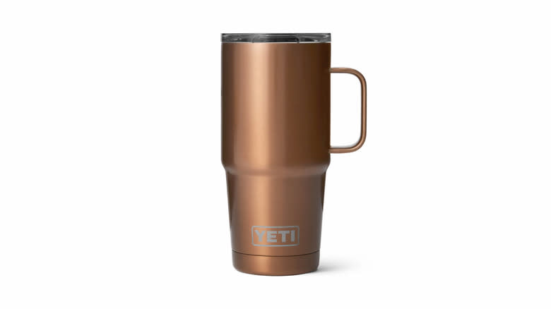 Copper travel mug on white