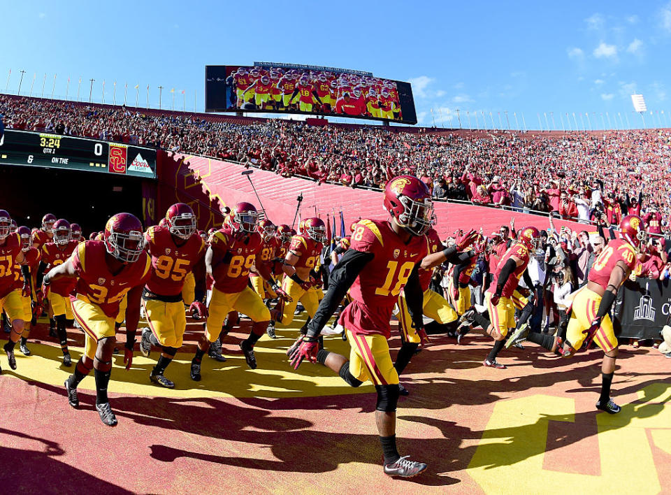 LOS ANGELES, CA - NOVEMBER 28: USC Trojans take to the field before the game against the UCLA Bruins at Los Angeles Memorial Coliseum. (Getty Images)