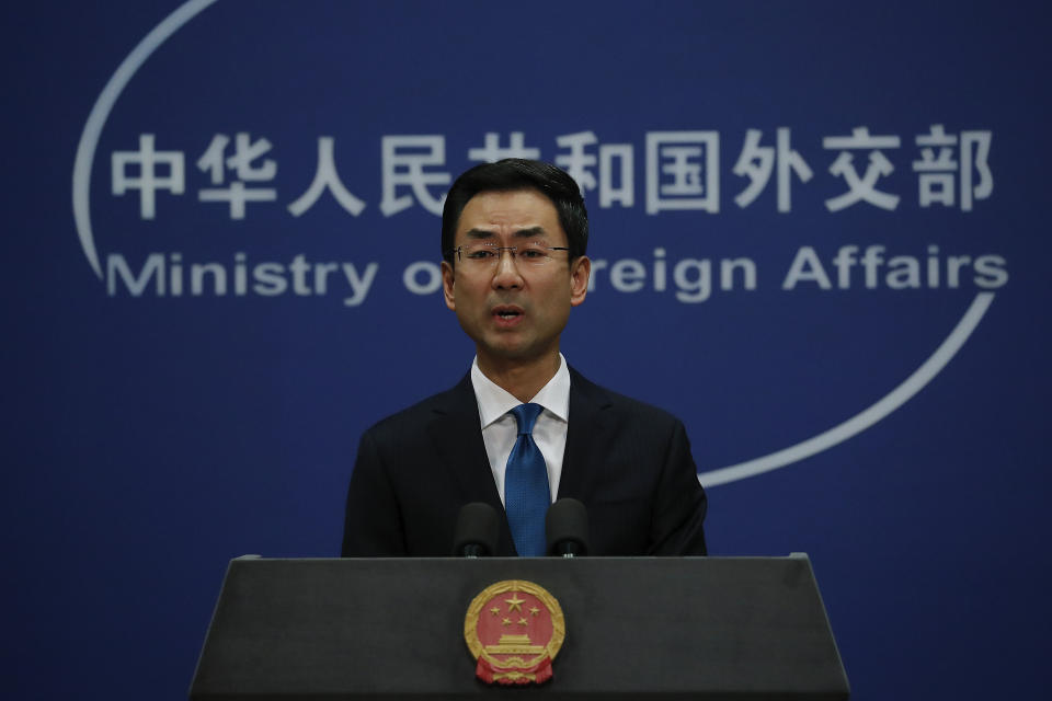 Chinese Foreign Ministry spokesman Geng Shuang speaks during a daily briefing at the Ministry of Foreign Affairs office in Beijing, Thursday, Nov. 28, 2019. China said the implementation of U.S. bills on Hong Kong human rights will undermine the two countries' "cooperation in important areas. Geng Shuang made the remarks at a press briefing on Thursday in response to a question about whether President Donald Trump's signing of the legislation will impact ongoing trade talks. (AP Photo/Andy Wong)