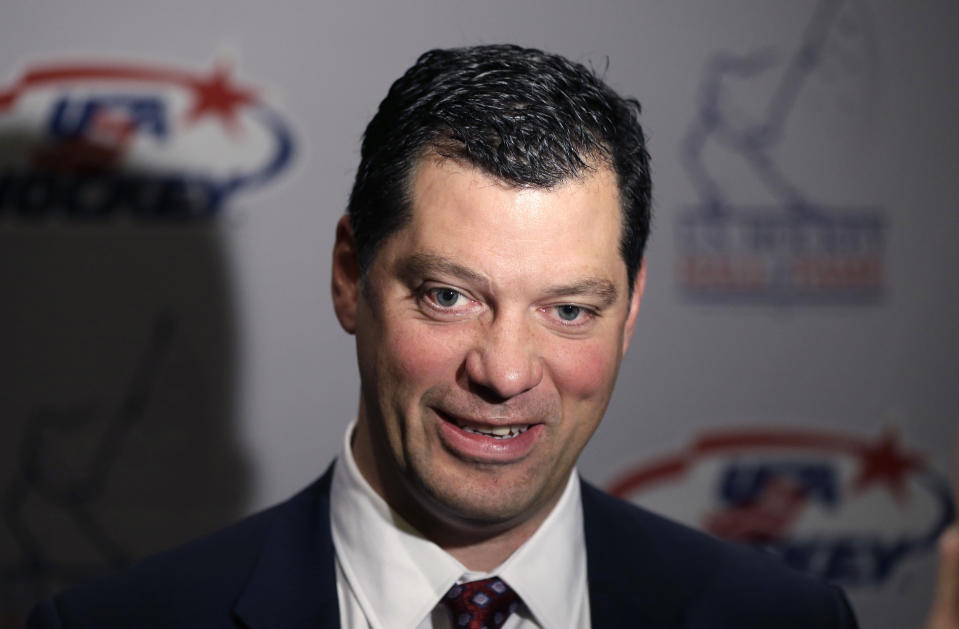 FILE - Bill Guerin addresses the media before his induction into the United States Hockey Hall of Fame in Detroit, Monday, Dec. 2, 2013. Guerin called it a “bumpy road” upon taking over as the United States men’s Olympic hockey team some two months following Stan Bowman’s resignation in the wake of the Chicago Blackhawks’ sexual assault scandal. “Unfortunately, things turned out the way they did and we’re here today,” Guerin said Tuesday, Dec. 14, 2021, during a USA Hockey Zoom conference call. (AP Photo/Carlos Osorio, File)