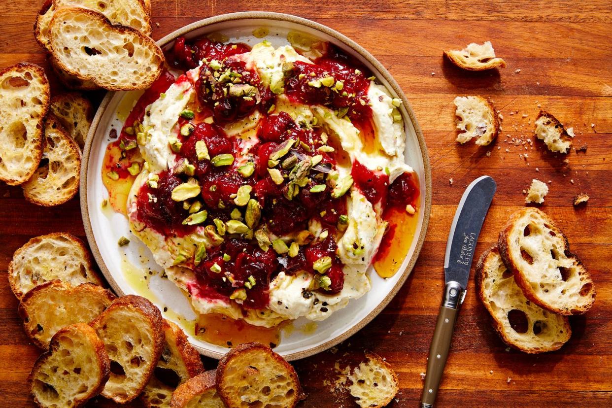 whipped garlic and herb feta, topped with fresh cranberry sauce, pistachios, and honey