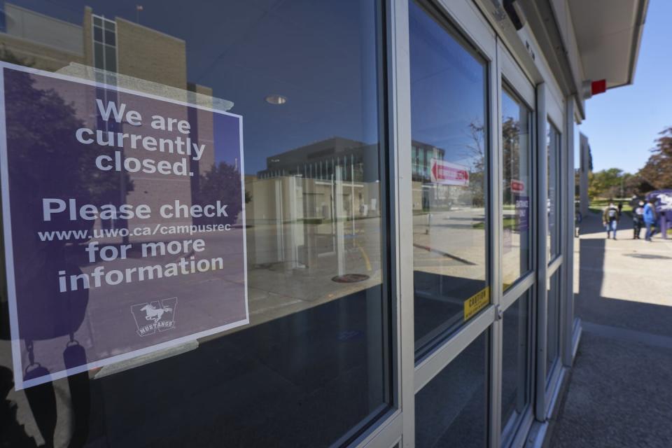 A closed sign on a campus building. 