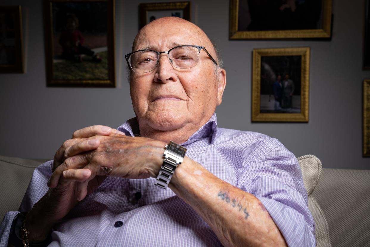 Holocaust survivor David Wolnerman at his home in Des Moines shows the number the Nazis tattooed on his forearm at Auschwitz.