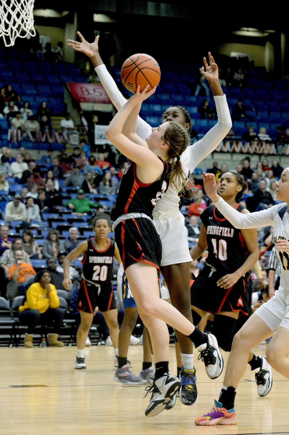 Springfield High School's Megan McMullan shoots against Southeast during the City Tournament on Saturday, Jan. 28, 2023.