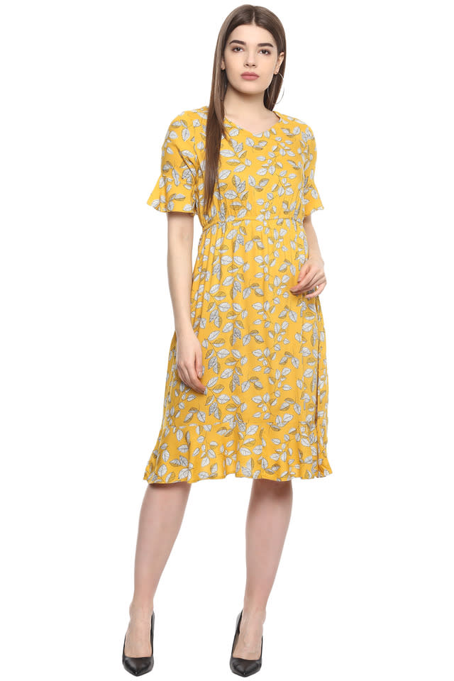 <a href="https://fave.co/3flbGJL" rel="noopener" target="_blank" data-ylk="slk:BUY HERE;elm:context_link;itc:0;sec:content-canvas" class="link ">BUY HERE </a>Yellow floral midi dress, by Fratini Woman from Shoppers Stop, for a discounted price of Rs. 749