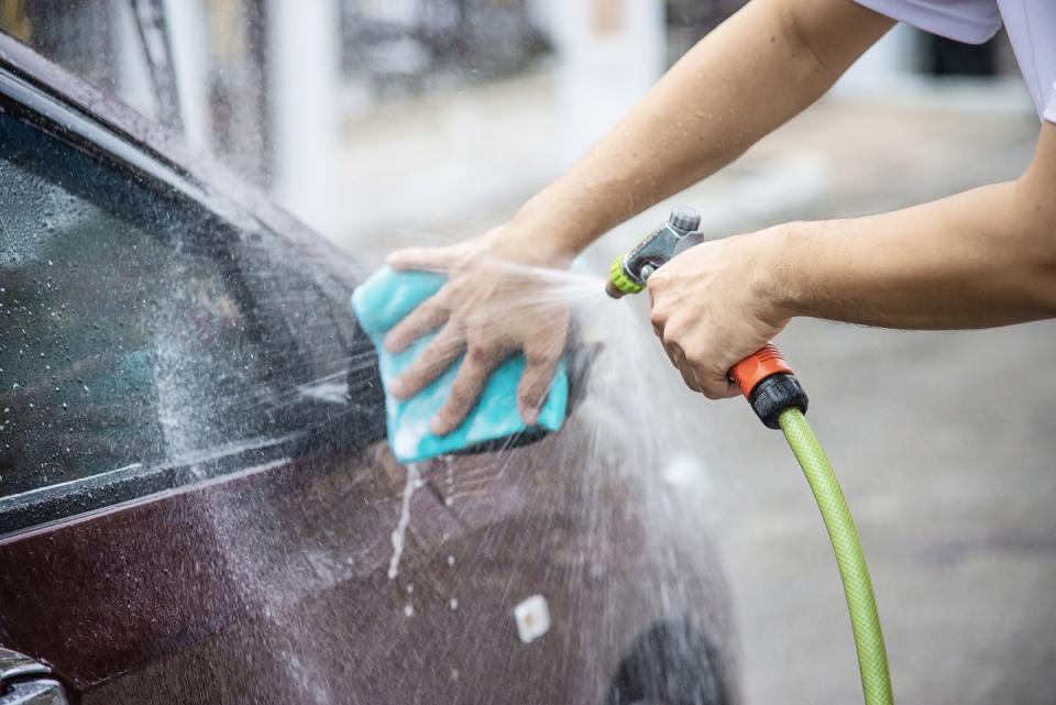 Rinsing Off Car