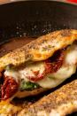 <p>This is the most flavorful chicken ever.</p><p>Get the recipe from <a href="/cooking/recipe-ideas/recipes/a51614/best-caprese-stuffed-chicken-recipe/" data-ylk="slk:Delish;elm:context_link;itc:0;sec:content-canvas" class="link ">Delish</a>.</p>