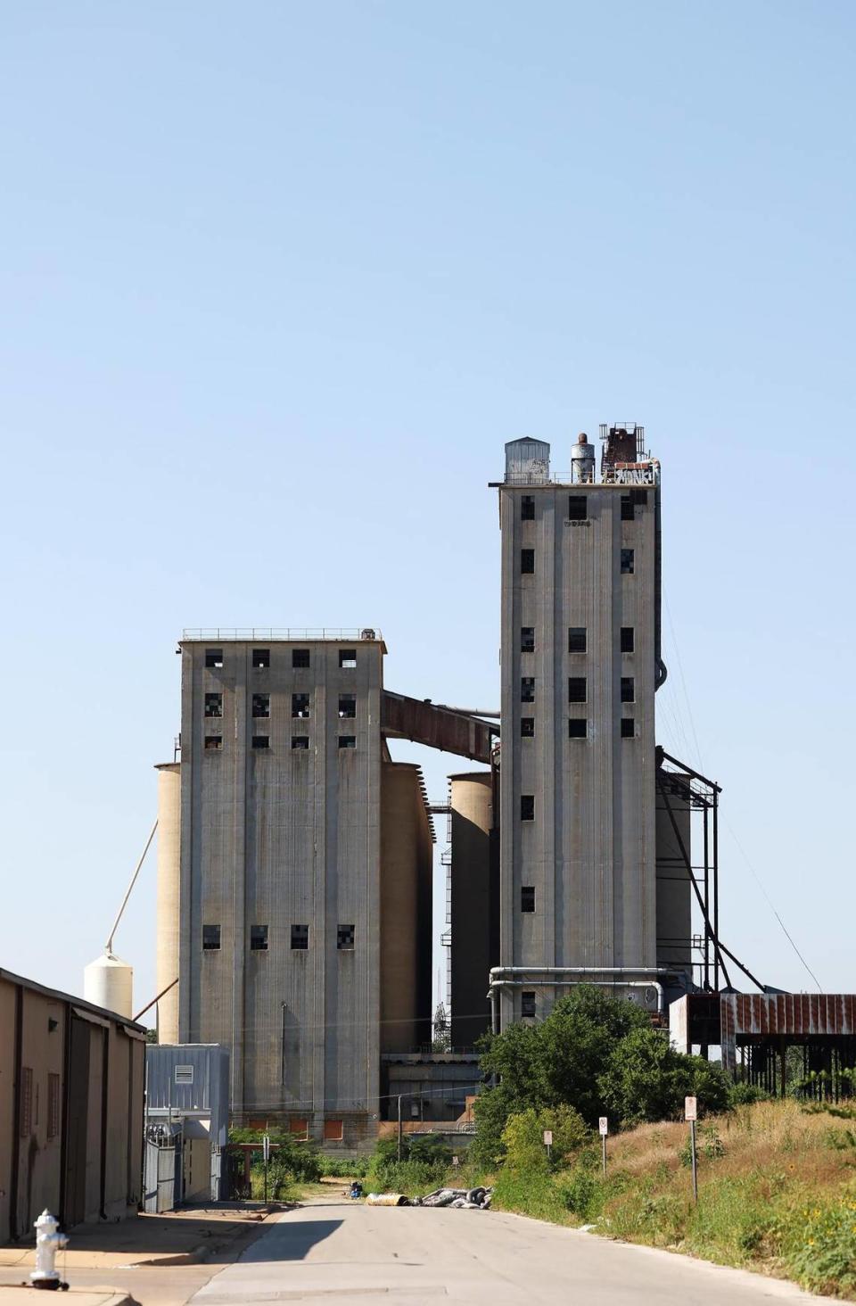 Abandoned silos and grain elevator rise above the Worth Heights neighborhood of Fort Worth.