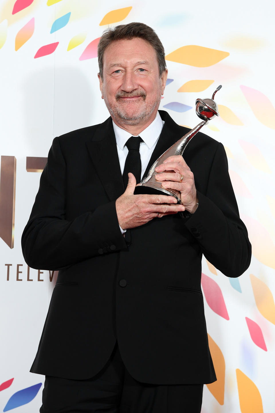 Steven Knight winner of the best Drama Award for Peaky Blinders pose in the winners room during the National Television Awards 2020 at The O2 Arena on January 28, 2020 in London, England. (Photo by Mike Marsland/WireImage)