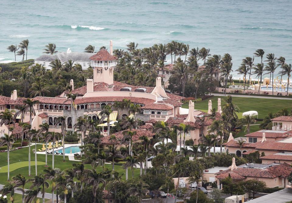 Just listed at $59 million, a beachside house owned by an entity controlled by former President Donald Trump at 1125 S. Ocean Blvd. in Pam Beach can be seen at the upper left beyond the tower of the The Mar-a-Lago Club. BRUCE R. BENNETT/palmbeachpost.com