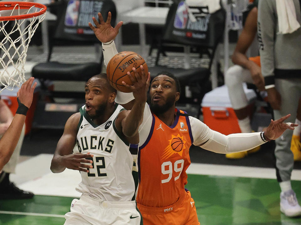 Bucks star Khris Middleton scores two of his 40 points in Game 4 of the NBA Finals. (Jonathan Daniel/Getty Images)