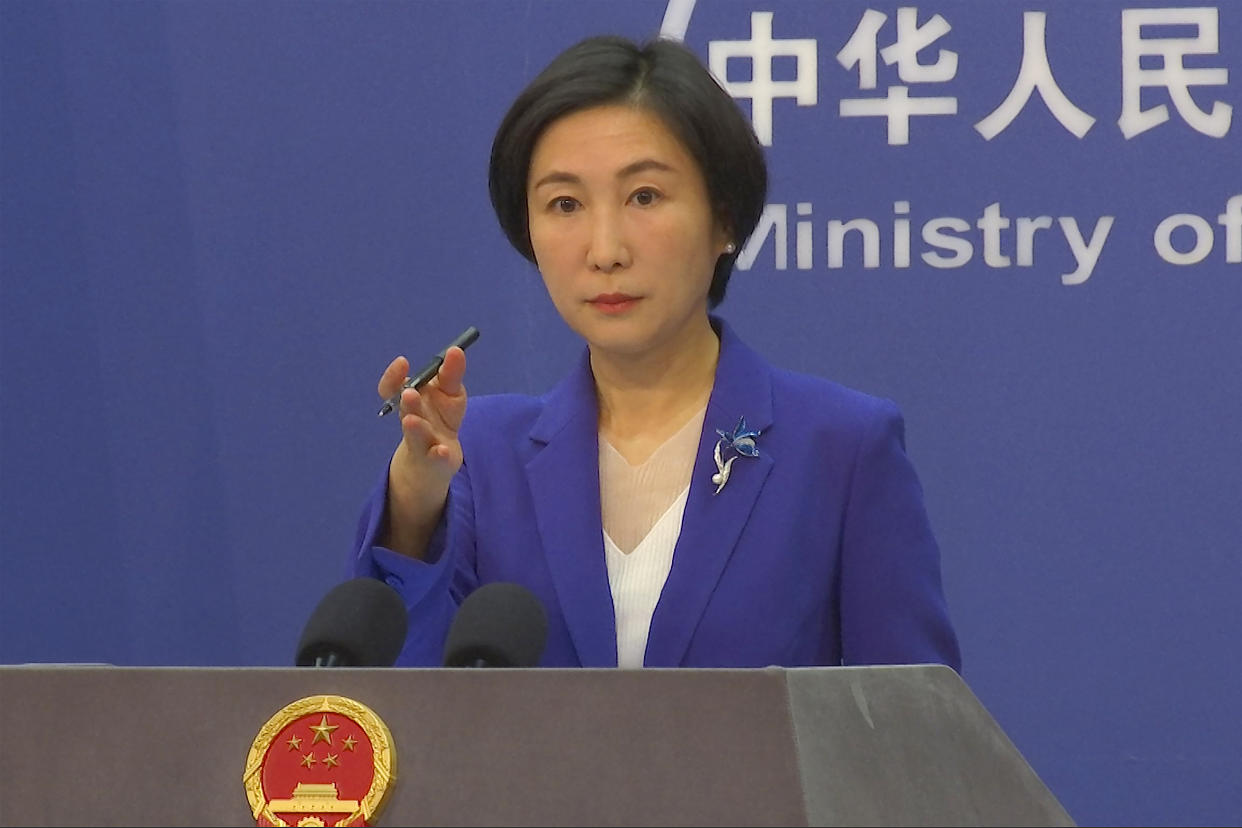 FILE - Chinese Foreign Ministry spokesperson Mao Ning gestures during a press conference at the Ministry of Foreign Affairs in Beijing, Thursday, Oct 13, 2022. China said Tuesday, Feb. 7, 2023, it will “resolutely safeguard its legitimate rights and interests” over the shooting down of a suspected Chinese spy balloon by the United States, as relations between the two countries deteriorate further. (AP Photo/Liu Zheng, File)