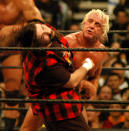 <p>Mick Foley and Ric Flair in action during a wrestling event. (Photo by Djamilla Rosa Cochran/WireImage) </p>