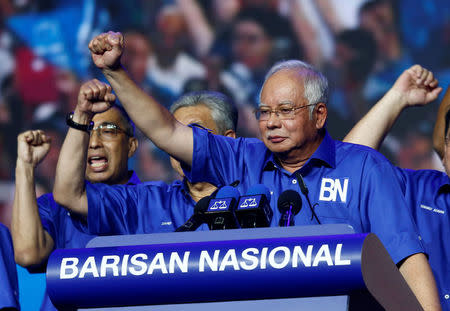 Malaysia's Prime Minister and president of ruling party National Front, Najib Razak gestures as he speaks during the launch of its manifesto for the upcoming general elections in Kuala Lumpur, Malaysia April 7, 2018. REUTERS/Lai Seng Sin