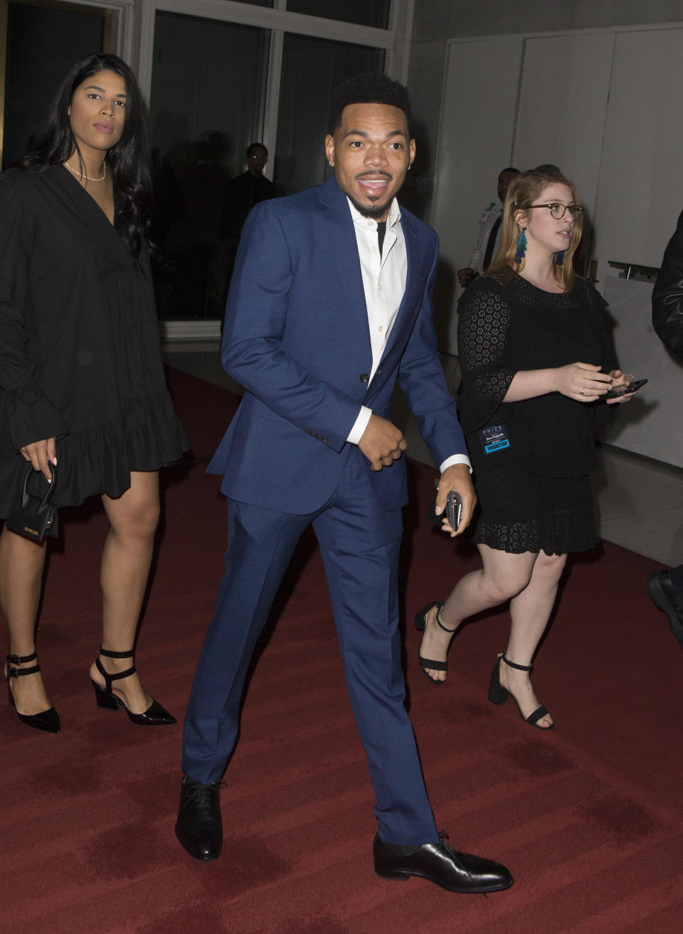 Chance the Rapper arrives at the Kennedy Center for the Performing Arts for the 22nd Annual Mark Twain Prize for American Humor presented to Dave Chappelle on Sunday, Oct. 27, 2019, in Washington, D.C. (Photo by Owen Sweeney/Invision/AP)
