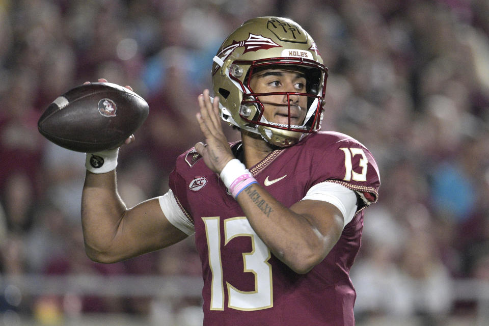 Florida State quarterback Jordan Travis throws a pass during the first half of an NCAA college football game against Duke, Saturday, Oct. 21, 2023, in Tallahassee, Fla. (AP Photo/Phelan M. Ebenhack)