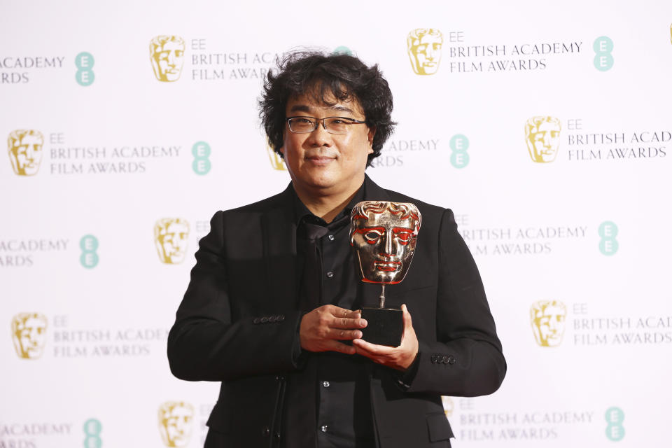 Bong Joon-ho collects the Bafta Award for the film Parasite, backstage at the Bafta Film Awards, in central London, Sunday, Feb. 2, 2020. (Photo by Joel C Ryan/Invision/AP)