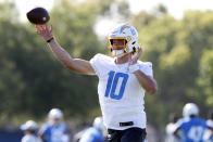 Los Angeles Chargers quarterback Justin Herbert throws a pass during practice at the NFL football team's training camp in Costa Mesa, Calif., Wednesday, July 28, 2021. (AP Photo/Alex Gallardo)