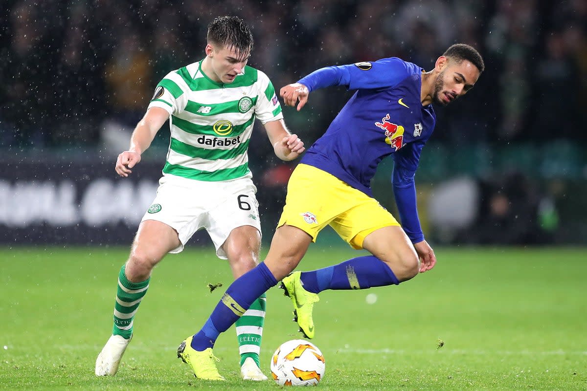 Celtic’s Kieran Tierney (left) and RB Leipzig’ Matheus Cunha battle for the ball during the UEFA Europa League, Group B match at Celtic Park, Glasgow. (PA Archive)