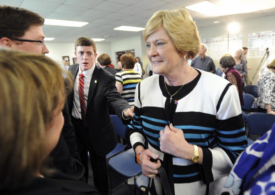 Tyler Summitt reaches for his mother, Hall-of-Fame Tennessee Lady Vols coach Pat Summitt, after a press conference Wednesday, April 2, 2014 to announce Tyler Summitt, 23, as the new women's basketball coach at the college, in Ruston, La. (AP Photo/The Shreveport Times, Douglas Collier) MAGS OUT; MANDATORY CREDIT SHREVEPORTTIMES.COM; NO SALES