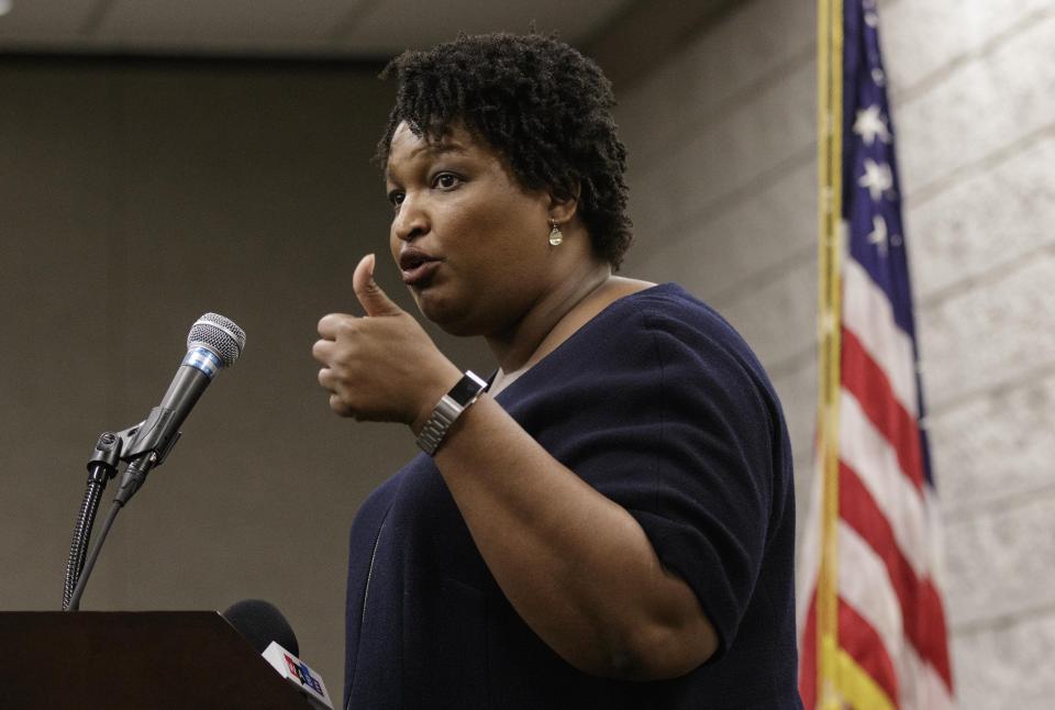 Democratic candidate for governor Stacey Abrams speaks during a town hall forum at the Dalton Convention Center on Wednesday, Aug. 1, 2018, in Dalton, Ga. Abrams is running against Republican candidate Brian Kemp in Georgia's November general election.