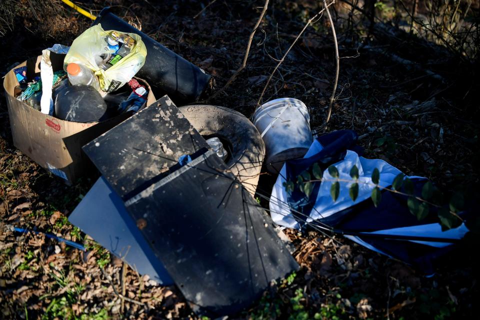 Litter along Amboy Road in Asheville December 22, 2020.