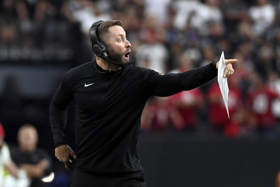 Arizona Cardinals head coach Kliff Kingsbury yells from the sideline during the second half of an NFL football game against the Las Vegas Raiders Sunday, Sept. 18, 2022, in Las Vegas. (AP Photo/David Becker)