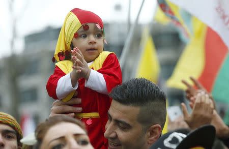 People attend a demonstration organised by Kurds, in Frankfurt, Germany, March 18, 2017. REUTERS/Ralph Orlowski