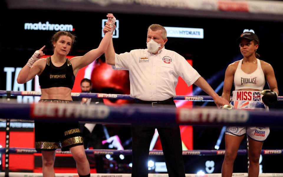 Katie Taylor celebrates her victory - MARK ROBINSON