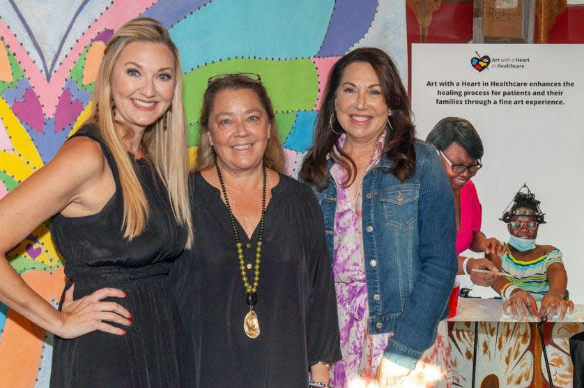 Art with a Heart in Healthcare's board chair Hillary Whitaker (from left), executive director Christy Ponder and co-founder Lisa Ullmann  hosted "A Fine HeArt Experience" at the Ponte Vedra Concert Hall to raise money for the organization, which provides creative arts experiences for patients at several local hospitals.