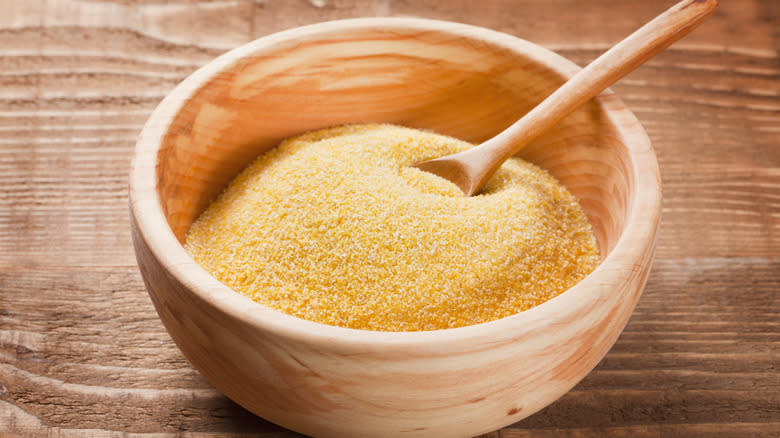 Wooden bowl of cornmeal