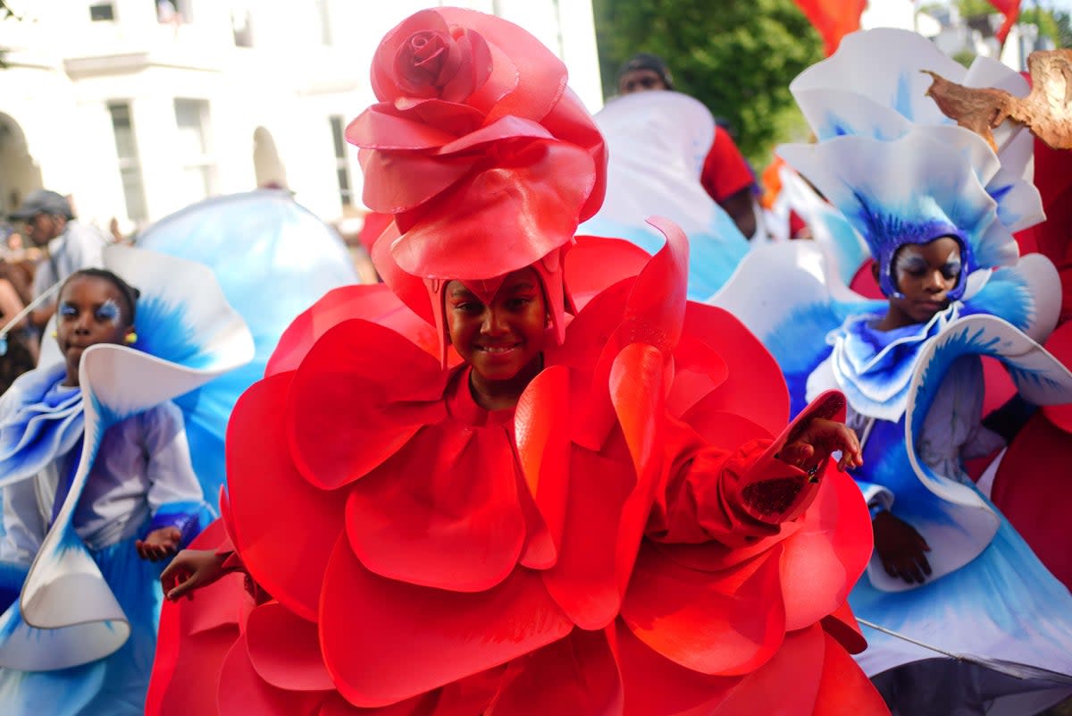 Performers during the children’s parade on Family Day at the Notting Hill Carnival in London (Victoria Jones/PA) (PA Wire)