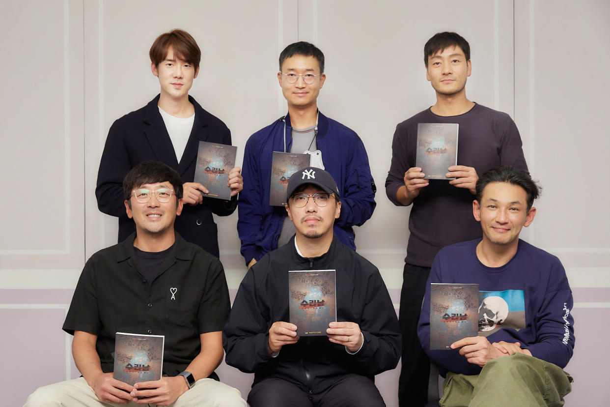 Director Yoon Jong-bin (front, centre) with the cast of Suriname (working title): (clockwise from top left) Yoo Yeon-seok, Jo Woo-jin, Park Hae-soo, Hwang Jung-min and Ha Jung-woo. (Photo: Netlfix)