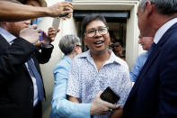 Reuters reporter Wa Lone reacts as he is freed from Insein prison after receiving a presidential pardon in Yangon, Myanmar, May 7, 2019. REUTERS/Ann Wang