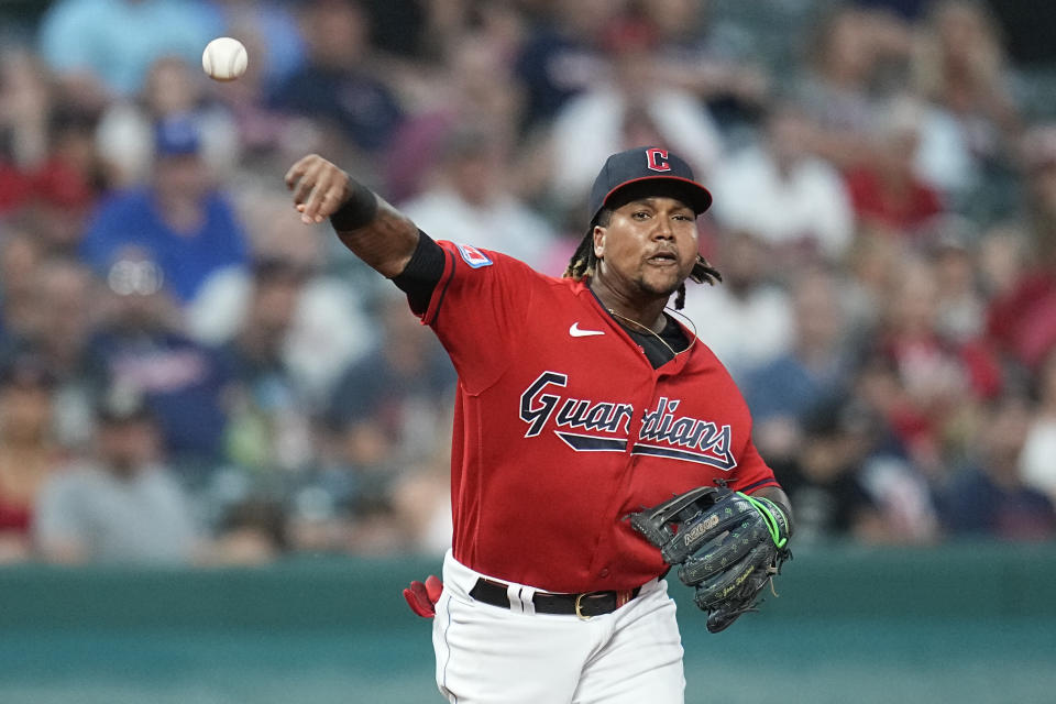 Cleveland Guardians third baseman Jose Ramirez throws out Toronto Blue Jays' Danny Jansen at first base during the sixth inning of a baseball game Wednesday, Aug. 9, 2023, in Cleveland. (AP Photo/Sue Ogrocki)