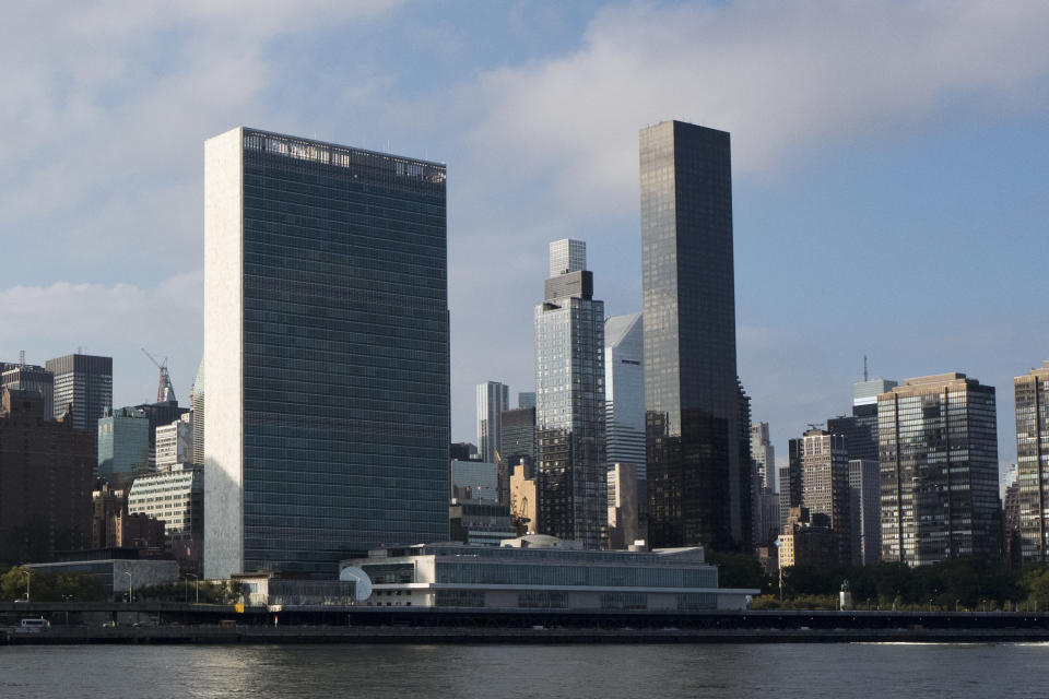 In this Oct. 10, 2018 photo, Trump World Tower, right, rises above the United Nations headquarters, left, in New York. In 2001, Donald Trump’s business ties to Saudi Arabia run long and deep, and he’s often boasted about his business ties with the kingdom. Now those ties are under scrutiny as the president faces calls for a tougher response to the kingdom’s government following the disappearance, and possible killing, of one of its biggest critics, journalist and activist Jamal Khashoggi. Trump said Friday that he will soon speak with Saudi Arabia's king about Khashoggi’s disappearance. (AP Photo/Mark Lennihan)