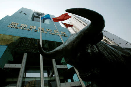 A statue of a bull is displayed outside the Shenzhen Stock Exchange in the southern Chinese city of Shenzhen October 23, 2009. REUTERS/Bobby Yip/File Photo