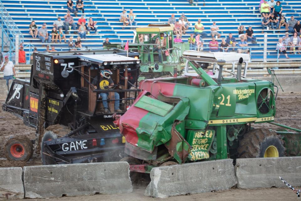 Two machines collide during the combine demolition derby event at the 75th Annual Monroe County Fair.