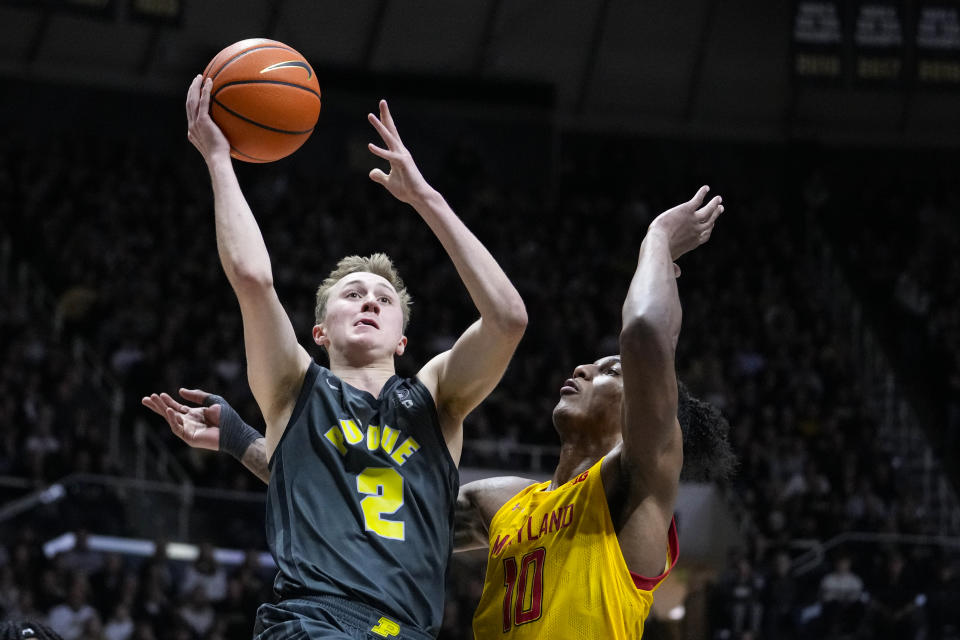 Purdue guard Fletcher Loyer (2) shoots over Maryland forward Julian Reese (10) during the second half of an NCAA college basketball game in West Lafayette, Ind., Sunday, Jan. 22, 2023. Purdue defeated Maryland 58-55. (AP Photo/Michael Conroy)