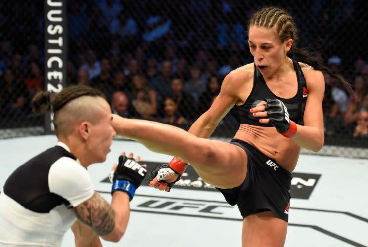 Joanna Jędrzejczyk (R) is the only strawweight champ the UFC has ever known. (Getty)