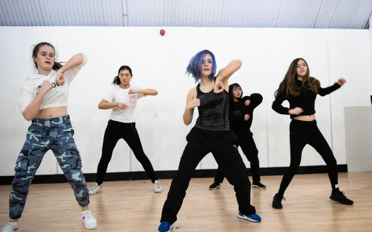 Dance students take part in a high energy K-Pop dance class in London. - John Nguyen/JNVisuals