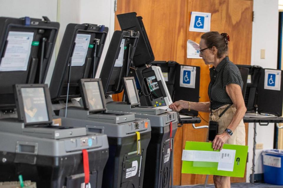 Miami Beach residents vote at the early voting polling place at the Miami Beach City Hall, on Tuesday, October 31, 2023.