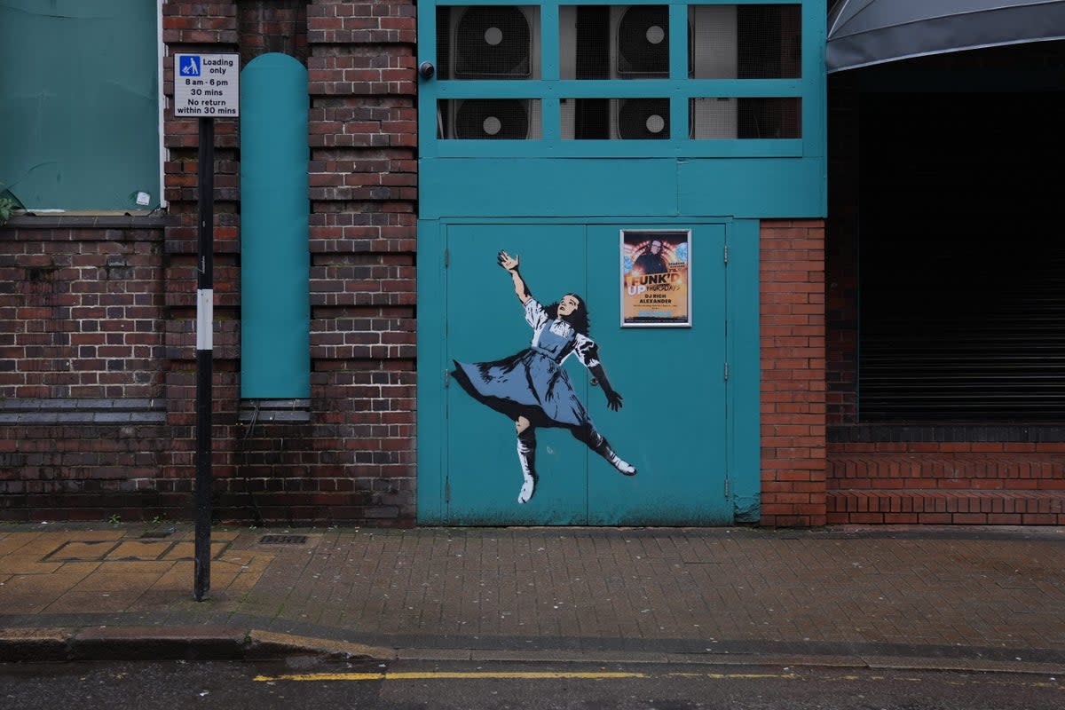 A mural depicting Dorothy from The Wizard Of Oz, on the side of Sidewalk bar on Kent Street in Birmingham (PA Wire)