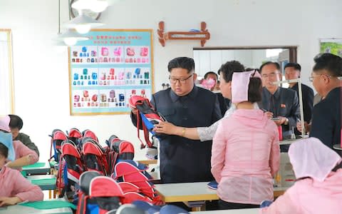 Kim also inspected the Chongjin Bag Factory in North Hamgyong Province - Credit: AFP