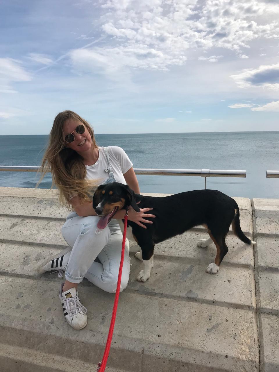 jordan mautner and dog on beach