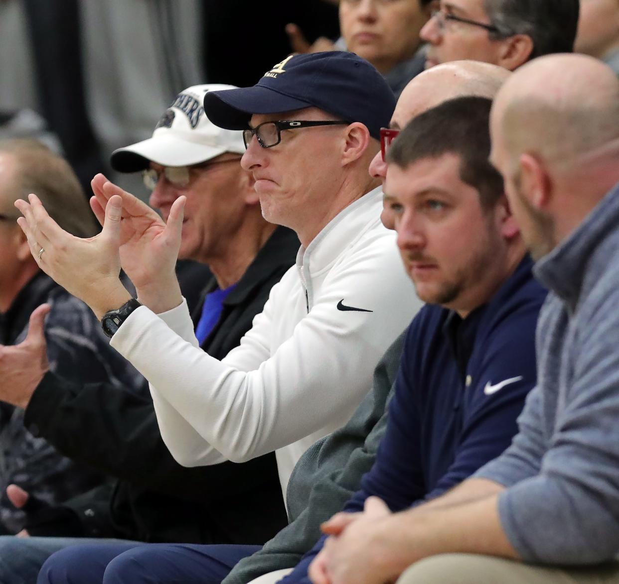 Akron Zips men's basketball coach John Groce cheers on his son Conner during the first half at Copley, Friday, Jan. 26, 2024.